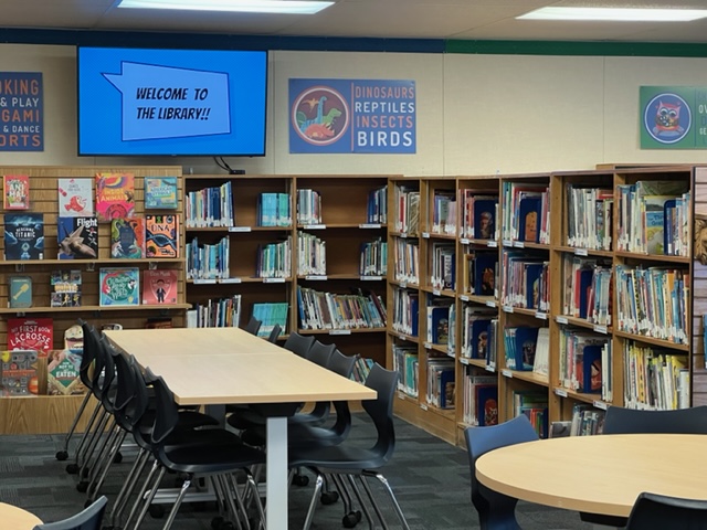 Loyola Library with shelves and tables